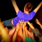 Crowd Surfer (image by Photos by Mavis, Flickr, CC)